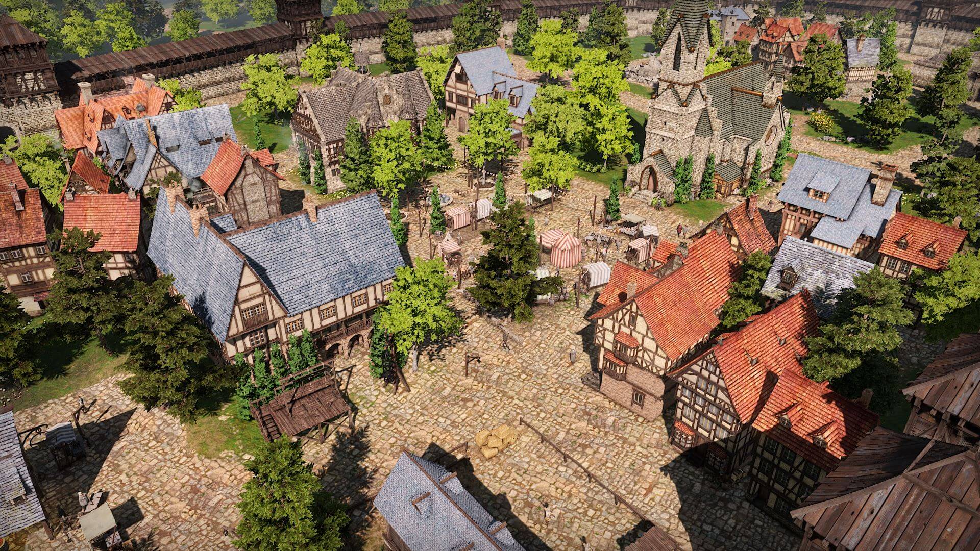 Aerial view of a medieval The Guild 3 town with districts, market and buildings